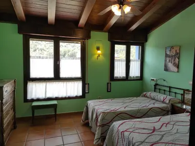 Cama o camas de una habitación en Casa Felisa Pirineo Aragonés