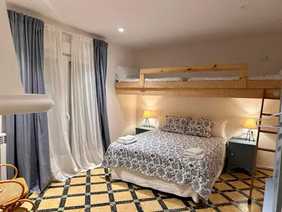 Cama o camas de una habitación en CAL GUINEU