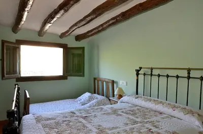 Cama o camas de una habitación en Apartamento Vivienda Sampietro