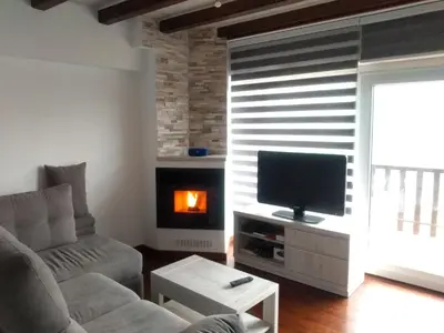 Una televisión o centro de entretenimiento en Apartamento Ismael