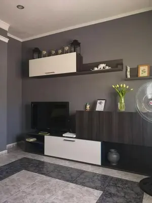 Una televisión o centro de entretenimiento en Bright apartment in Barbastro, 70m², parking included