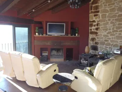 Una televisión o centro de entretenimiento en CASA ARENS