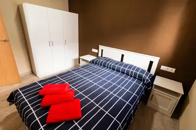 Cama o camas de una habitación en CASA CAL METGE