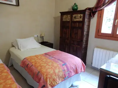 Cama o camas de una habitación en Cal Alemany