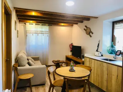 Zona de estar de Apartamentos Zabalarena Artzaia