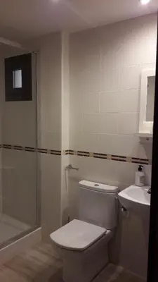 Un baño de Apartamentos Casa Trato