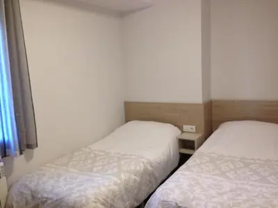 Cama o camas de una habitación en Apartamentos Casa Trato