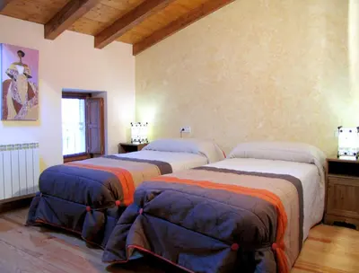 Cama o camas de una habitación en Casa Rural Urandi I