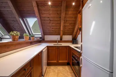 Una cocina o zona de cocina en TAMARRO de Alma de Nieve