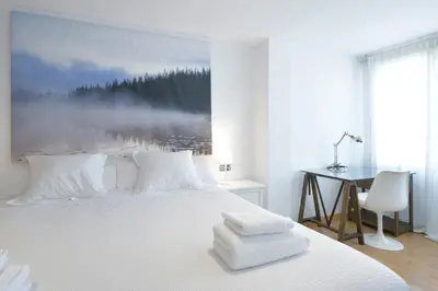 Cama o camas de una habitación en Andrews house, 60 m en el centro de Zaragoza
