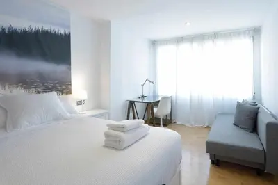 Cama o camas de una habitación en Andrews house, 60 m en el centro de Zaragoza