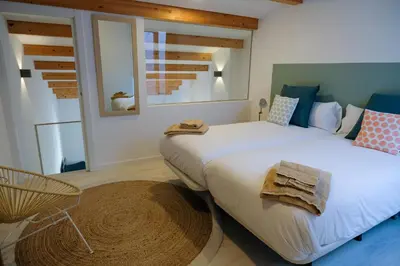 Cama o camas de una habitación en Silken Casa Platerias Siglo XV