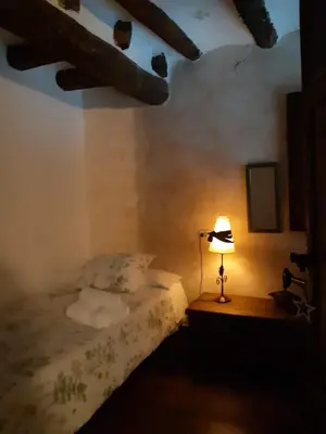 Cama o camas de una habitación en Lo Cremallé