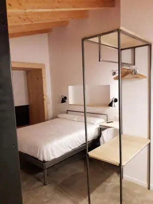 Cama o camas de una habitación en Hotel EN