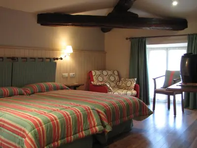 Cama o camas de una habitación en Hostal Beti-jai
