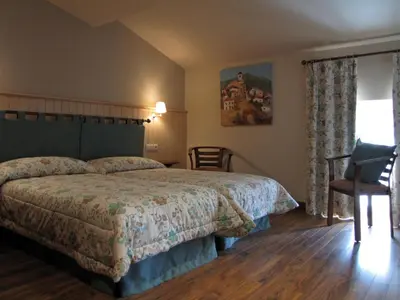 Cama o camas de una habitación en Hostal Beti-jai