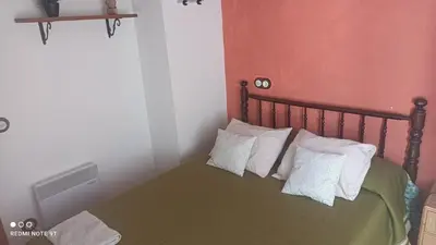 Cama o camas de una habitación en L'Antic Forn de Paüls