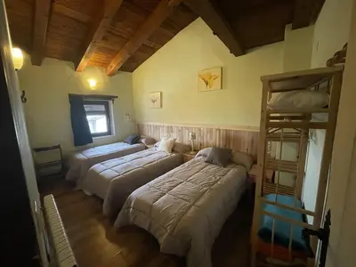 Cama o camas de una habitación en Casa rural Lo Regolfo