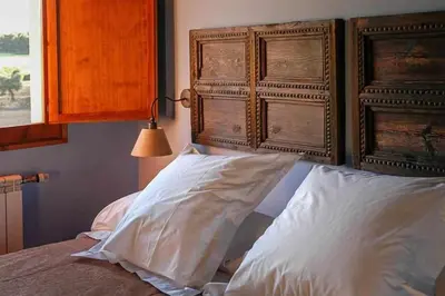 Cama o camas de una habitación en Casa rural restaurante Mas Del Rei