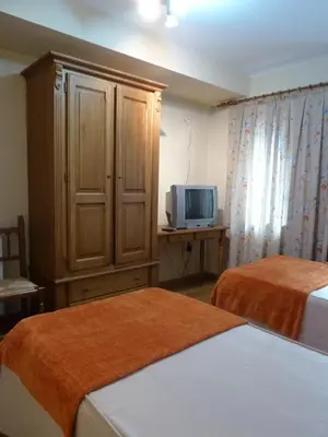 Cama o camas de una habitación en Apartahotel Faure