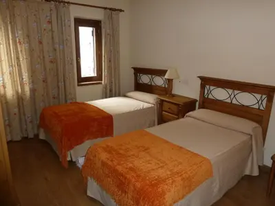 Cama o camas de una habitación en Apartahotel Faure