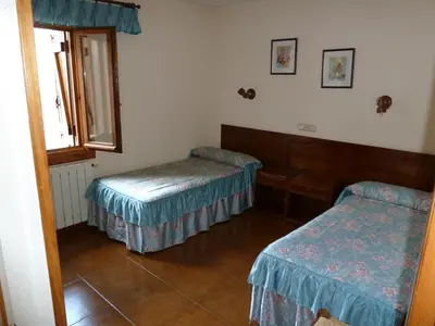 Cama o camas de una habitación en Apartahotel Faure