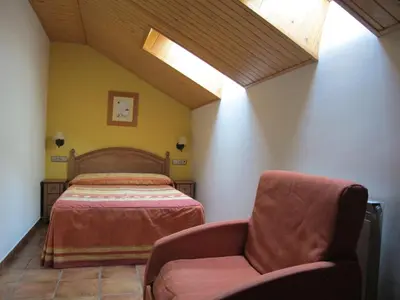 Cama o camas de una habitación en Apartamentos Casa Español