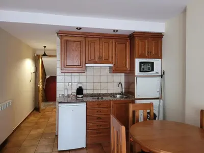 Una cocina o zona de cocina en Apartamentos Casa Español