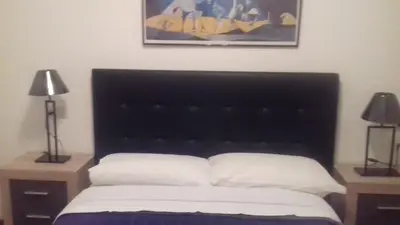 Cama o camas de una habitación en Pensión Room Pamplona
