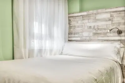 Cama o camas de una habitación en PURA VIDA PIRINEOS