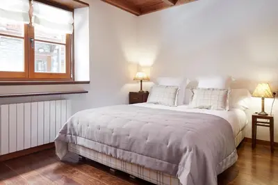 Cama o camas de una habitación en Val de Ruda 64 by FeelFree Rentals