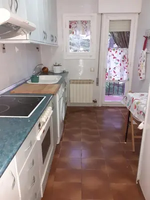 Una cocina o zona de cocina en Apartamento El Portiel