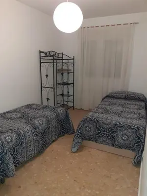 Cama o camas de una habitación en Apartamento El Portiel