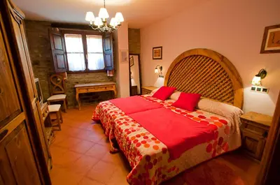 Cama o camas de una habitación en Hotel Villa Románica