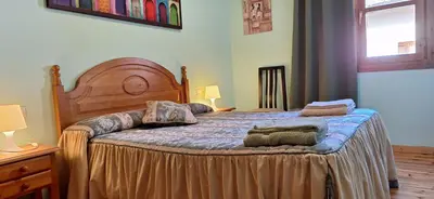 Cama o camas de una habitación en BALLBENAS