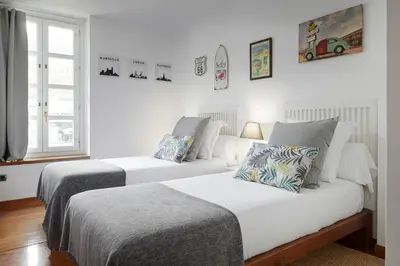 Cama o camas de una habitación en Comets by FeelFree Rentals