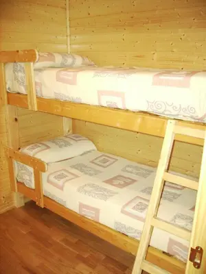 Cama o camas de una habitación en Camping Cañones de Guara y Formiga