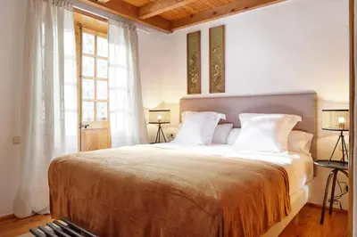 Cama o camas de una habitación en Banhs de Arties by FeelFree Rentals