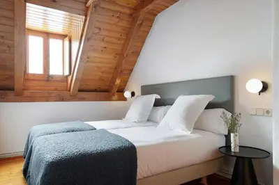 Cama o camas de una habitación en Banhs de Arties by FeelFree Rentals