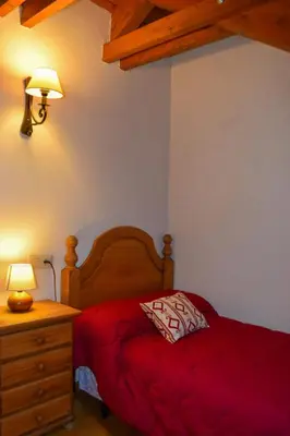 Cama o camas de una habitación en Duplex con vistas en Benasque