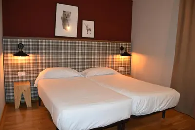 Cama o camas de una habitación en SNÖ Vall de Boí
