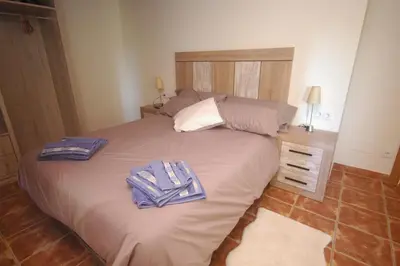 Cama o camas de una habitación en Torre del mig