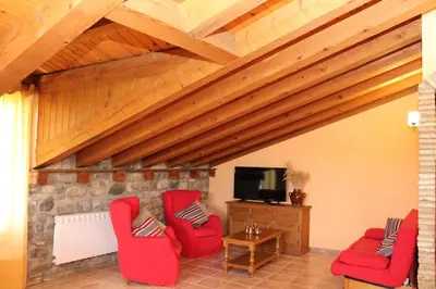 Una televisión o centro de entretenimiento en Apartamentos Clavería