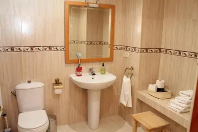 Un baño de Apartamentos Clavería