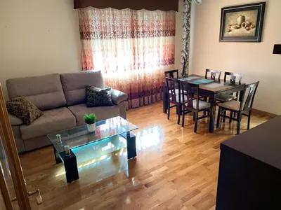 Zona de estar de Apto Alma Parking y Piscina GRATIS