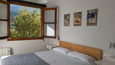 Cama o camas de una habitación en Casa Calpurnia Cerler