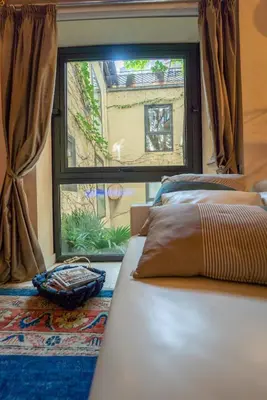 Cama o camas de una habitación en El Palacio de Argensola by Alogest