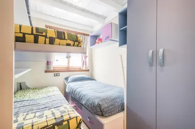 Cama o camas de una habitación en Marconi by Totiaran