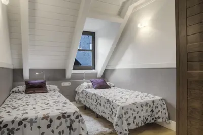 Cama o camas de una habitación en Vinyeta by Totiaran
