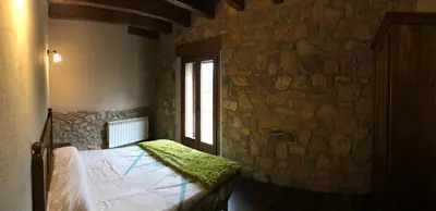 Cama o camas de una habitación en Cal Remolins